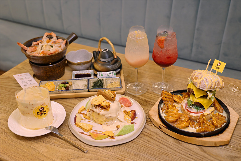 釜飯瀑布漢堡舒芙蕾與氣泡飲餐桌全景